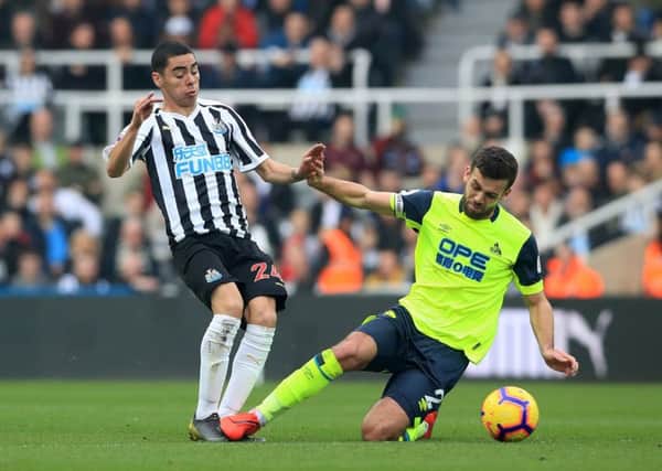 Key moment: Newcastle United's Miguel Almiron is brought down by Huddersfield Town's Tommy Smith, resulting in a red card.