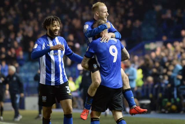 Sheffield Wednesday's Steven Fletcher is congratulated after giving his side the lead against Brentford at Hillsborough (Picture: Steve Ellis).