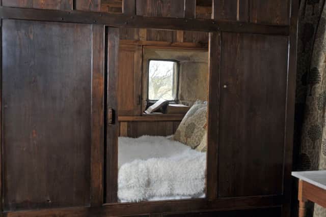 The replica box bed by the window said to have inspired the Cathy's ghost chapter in Wurthering Heights.