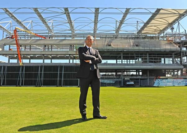 Mark Arthur, Yorkshire chief executive, with the new stand being built at Headingley Stadium. (Picture: Tony Johnson)