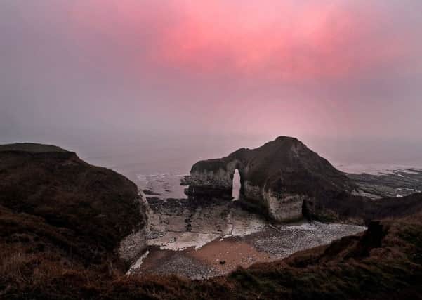 The 'dinosaur' rock formation at Flamborough Head at first light. Technical details Nikon D3s  with 12-24mm lens and exposure of 50th at f5.6, 800ISO. Picture Tony Johnson.