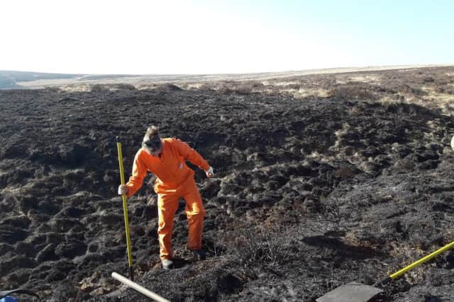 National Trust personnel and firefighters have been working at the scene of the fire today to search for any deep seated peatland still on fire. Picture courtesy of the National Trust.