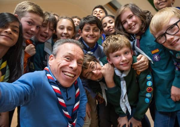 Actor Warwick Davis is an ambassador for the Scouts.