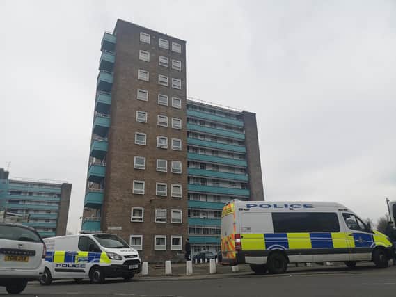 Police outside Ferriby Towers in Leeds where a man has fallen from the block of flats