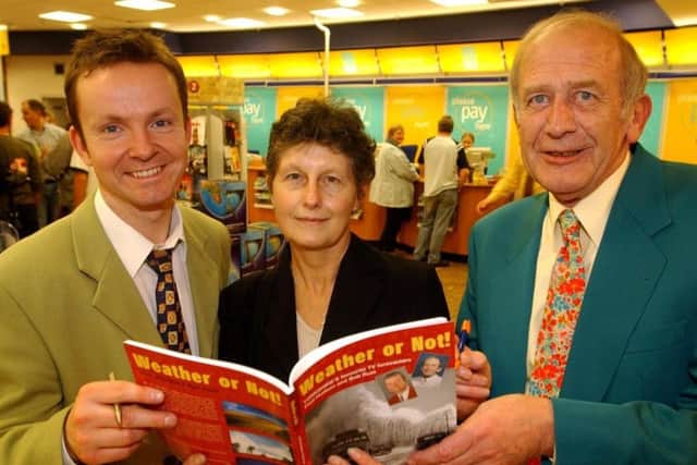 Bob Rust, right, with fellow weatherman and co-author of 'Weather or not' Paul Hudson (left) at a book signing with fan Diane Corker in 2003