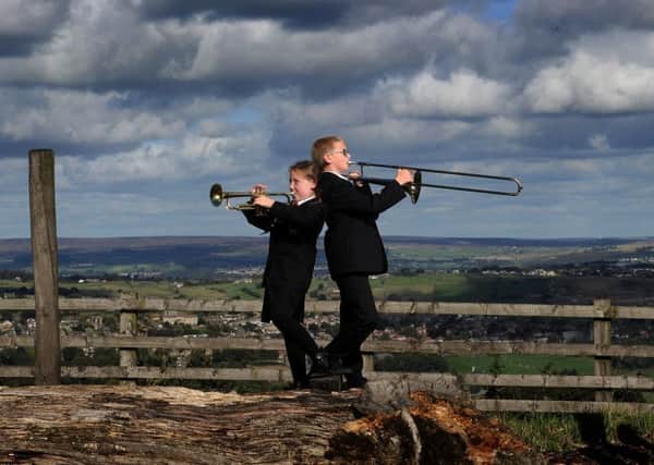 The Brass Band at Foxhill Primary School, Queensbury, is battling to save its Musical Talent. Lilly Manton and Nathan Elam are pictured at the school. ..Picture by Simon Hulme