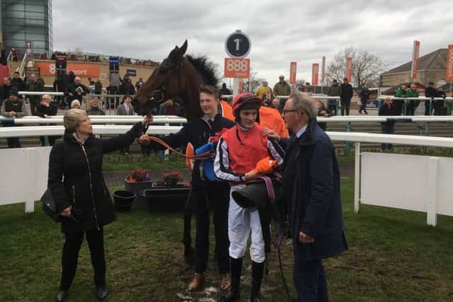 David and Nicky Robinson talk to jockey Craig Nichol after Chidswell won Doncaster's Grimthorpe Chase.