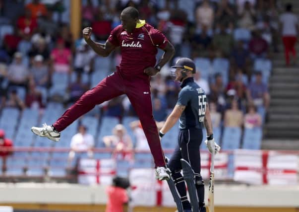 The West Indies Carlos Brathwaite celebrates dismissing Englands Ben Stoke in St Lucia (Picture: Ricardo Mazalan/AP).