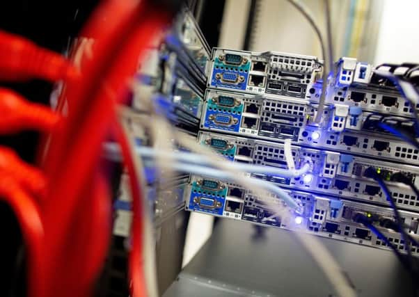 Cables link servers (Photo credit PAUL FAITH/AFP/Getty Images)