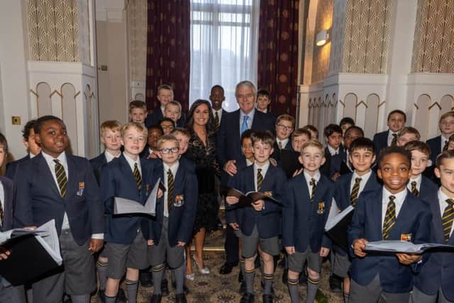 Date:7th December 2018.
Sir John Major guest speaker at the Yorkshire Business Awards, in aide of children's charity Variety, held at the Queens Hotel, Leeds. Pictured Nina Hossain,  British journalist and presenter on ITN, and Sir John Major meeting pupils from Queen Elizabeth Grammar School, Junior School, in Wakefield, before the event.