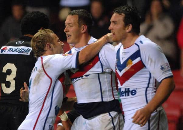 BACK ON THE AGENDA: Great Britain's Danny McGuire (centre) celebrates a try against New Zealand at Wigan back in 2007 with Leeds Rhinos' team-mate with Rob Burrow (left) and Martin Gleeson. Picture: Anna Gowthorpe/PA