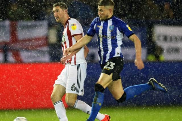 TO THE WIRE: Sheffield United central defender Chris Basham is expecting plenty more twists and turns. Picture: Steve Ellis.