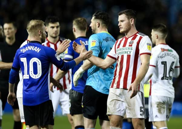 WELL PLAYED: Sheffield Wednesday's Barry Bannan and Sheffield United's Jack O'Connell of Sheffield United shake hands after the Steel City derby stalemate at Hillsborough. Picture: James Wilson/Sportimage