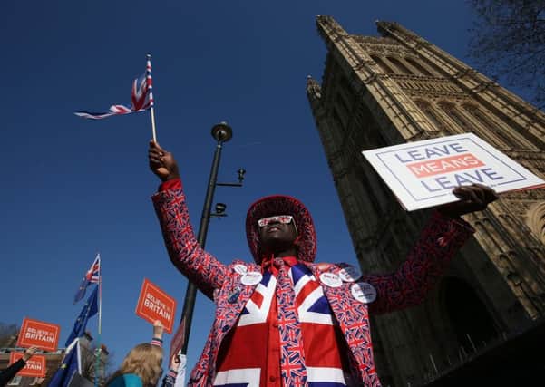Joseph Afrane joins pro-Brexit and anti-Brexit demonstrators in Parliament Square.  How can the country move on from Brexit? Bishop James Jones poses the question.