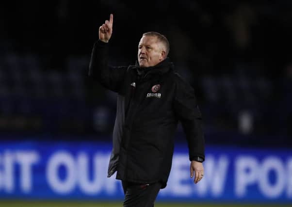Manager Chris Wilder salutes the Sheffield United fans after Mondays Steel City derby with Sheffield Wednesday, whose manager Steve Bruce he has pipped to the manager of the month award (Picture: Simon Bellis/Sportimage).