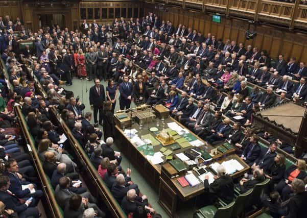 The scene in the House of Commons when Theresa May lost her first meaningful vote on Brexit.