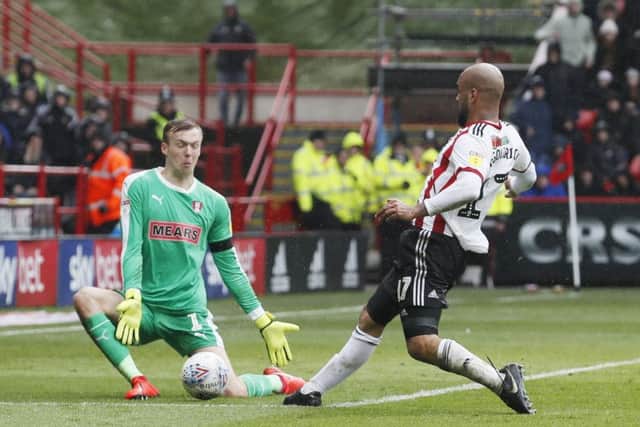 Marek Rodak of Rotherham United  saves at the feet of David McGoldrick. Picture: Simon Bellis/Sportimage