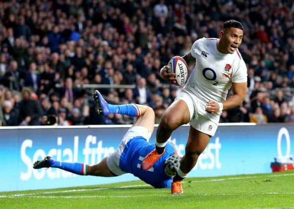 England's Manu Tuilagi scores his side's fifth try.