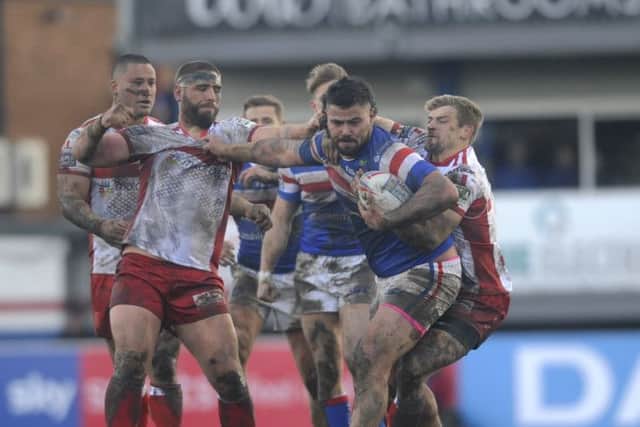 Wakefield Trinity v Hull KR..Wakefield player David Fifita breaks through the Hull KR tacklers.10th March 2019.Picture by Simon Hulme
