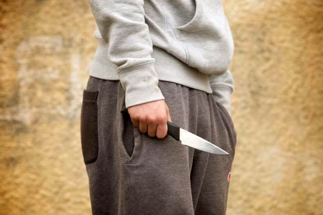 Former police officer GP Taylor is calling for radical action to stop the tide of knife crime. Picture posed by model.