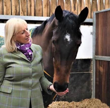 Owner Jayne Sivills with Cheltenham contender Lady Buttons.