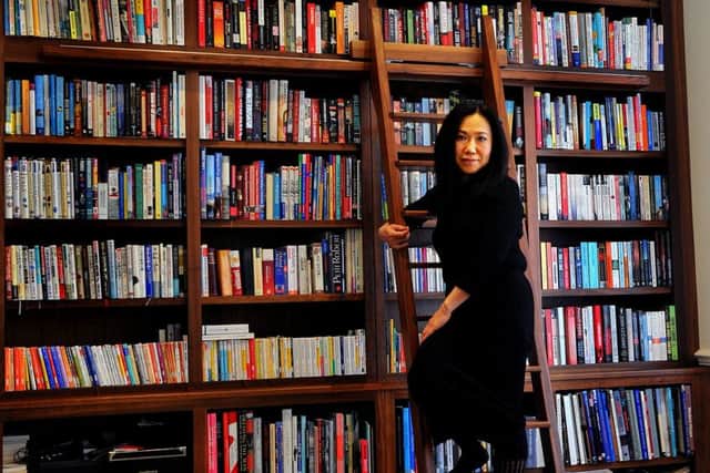 One of the reception rooms has been tarnsformed into a library/study. Makiko is pictured on the library ladder.