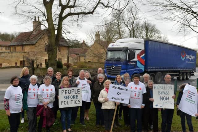 Lorries pass through Hickleton, Yorkshire's most polluted village. 7 March 2019.  Picture Bruce Rollinson