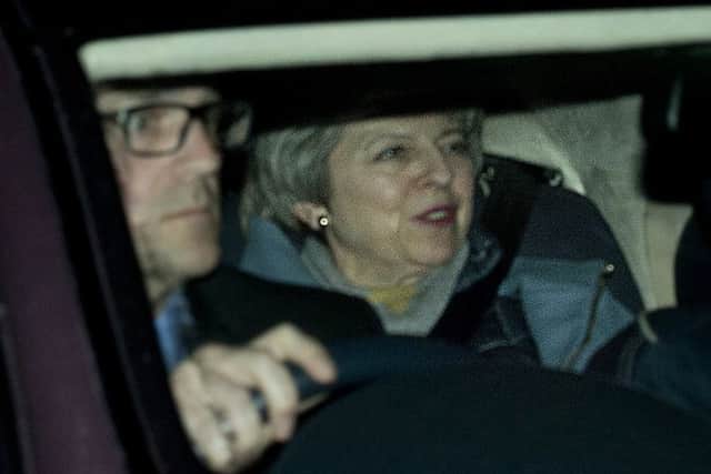 Theresa May, pictured returning to 10 Downing Street in the early hours of Tuesday mornings after brexit talks in Strasbourg.