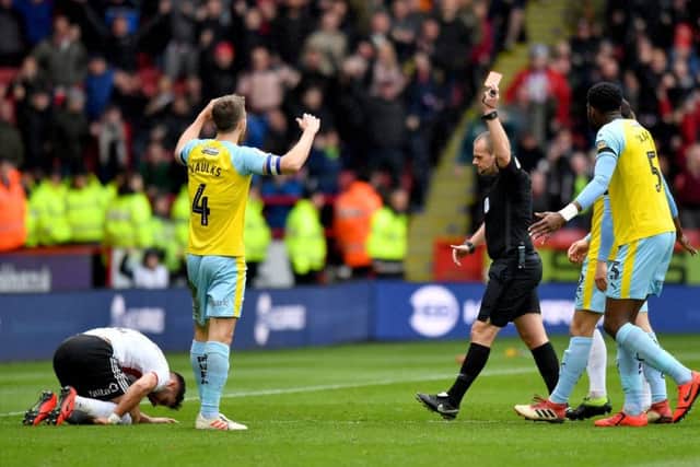 Rotherham United's Will Vaulks is dismayed after receiving a red card following a challenge on Sheffield United's George Baldock on Saturday (Picture: Anthony Devlin/PA Wire).