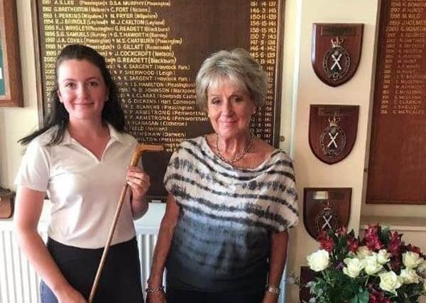 Huddersfield's Charlotte Heath pictured with Pleasington's lady president Pat Hindle after victory in the 2017 Pleasington Putter.