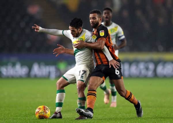 Hull City's Kevin Stewart, right, battles with Norwich City's Emi Buendia during the sides' goalless draw at KCOM Stadium last November (Picture: Simon Cooper/PA Wire).