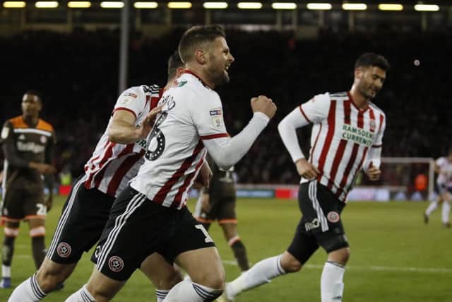 Oliver Norwood runs away after scoring the first goal, from the penalty spot, in Sheffield United's victory against Brentford (Picture: Simon Bellis/Sportimage).