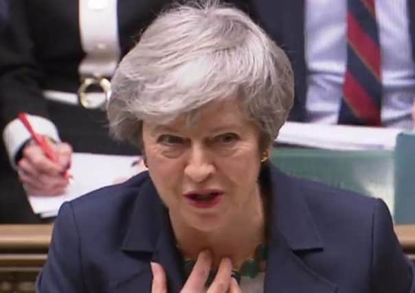 A croaky Theresa May told Jeremy Corbyn at PMQs: "I may not have my voice but I understand the voice of the country."