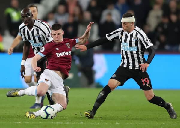West Ham's Declan Rice seen duelling with Javier Manquill, of Newcastle (Picture: Christopher Lee/Getty Images).
