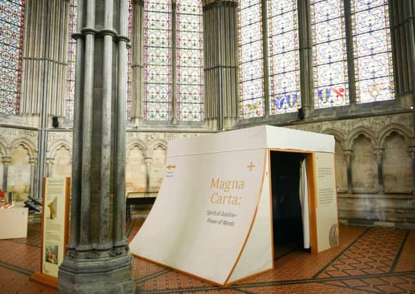 The small viewing cubicle which houses the glass case storing the Magna Carta, inside the Chapter House at Salisbury Cathedral.