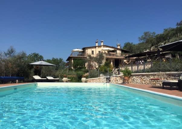 The Casale San Pietro as seen from the swimming pool, designed by Joe and Alana Mazza, who moved from Huddersfield to launch their dream destination.