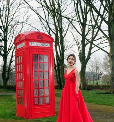 Millie Slater wears red Charlie dress with full skirt and 3D flower detail, £750, by Kate Fearnley.

 
At Bowcliffe Hall, Bramham. Picture by Simon Hulme; Styling by Stephanie Smith