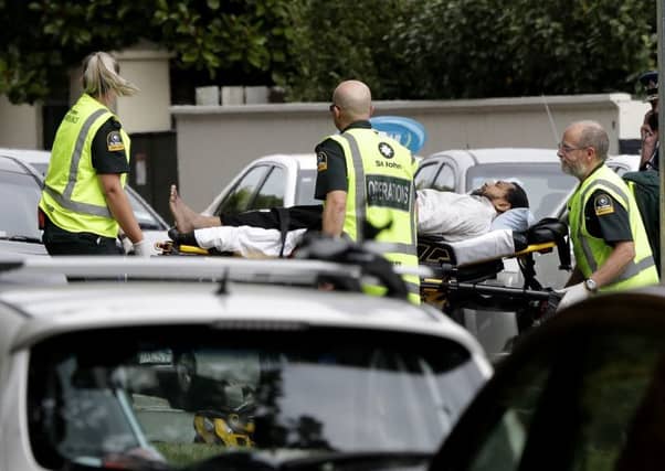 Ambulance personnel at one of the two mosques in Christchirch where at least 49 people were shot dead.