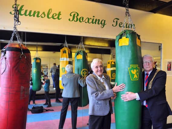 The Lord Mayor and Lady Mayoress of Leeds, Couns Graham and Pat Latty with a boxing punchbag on their visit to The Hunslet Club in Leeds .