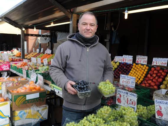 Shaun Dolan who has a family fruit and veg stall on the outdoor market.