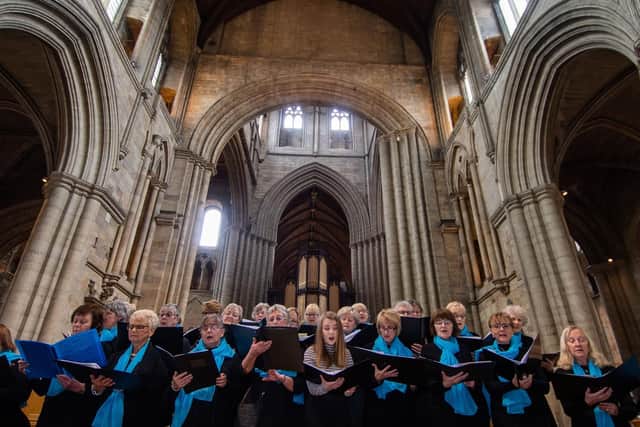 Members of The Federation Rock Choir Ripon Area, North Yorkshire West Federation of WI's singing in Ripon Catherdral.