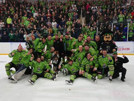 Hull Pirates' players and staff celebrate their North One league title triumph.