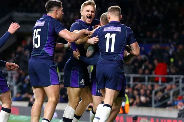 Scotland's Darcy Graham is mobbed by his team-mates after scoring his side's fourth try (Picture: Gareth Fuller/PA Wire)