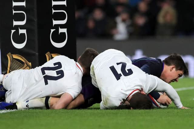 Scotland's Sam Johnson scores his side's sixth try of the game to put them in front for the first time.