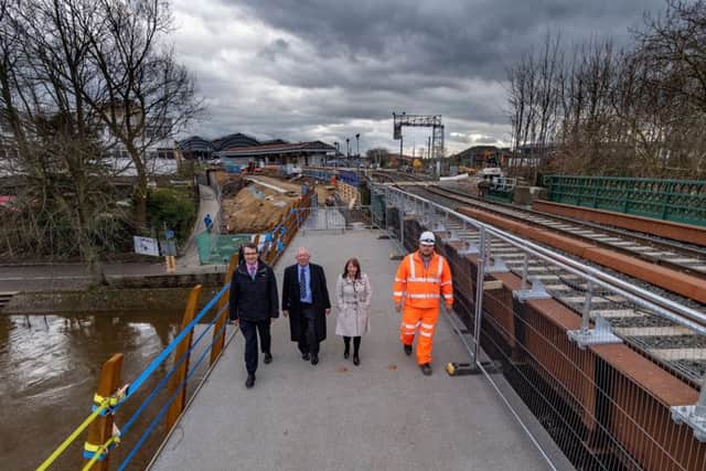 The first walk across the new Scarborough Bridge, in York, over the River Ouse after it was closed to allow construction work for a new, wider and more accessible footbridge 65-meters long and three times as wide.
