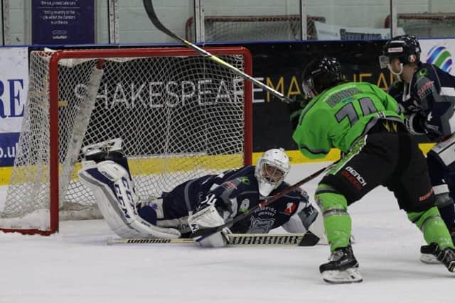 THAT SETTLES IT: Lee Bonner scores Hull Pirates' eighth and final goal against NIHL North One rivals Sheffield Steeldogs. Picture: Peter Best