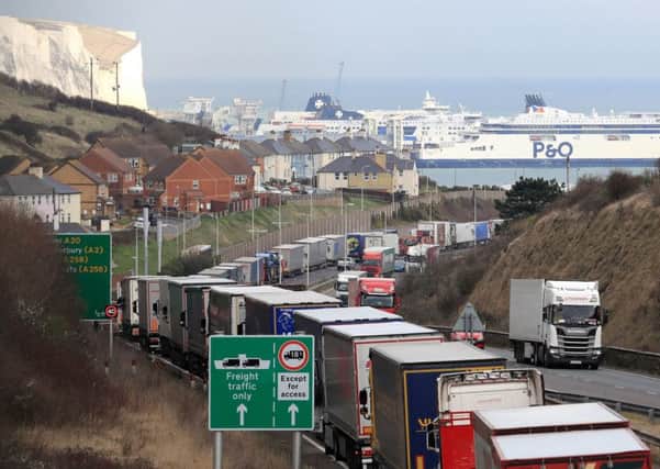 Lorries queue on the A20 to enter the Port of Dover in Kent, as French customs officers continue their work-to-rule industrial action to protest over pay and show the effect Brexit will have on cross-Channel passengers.