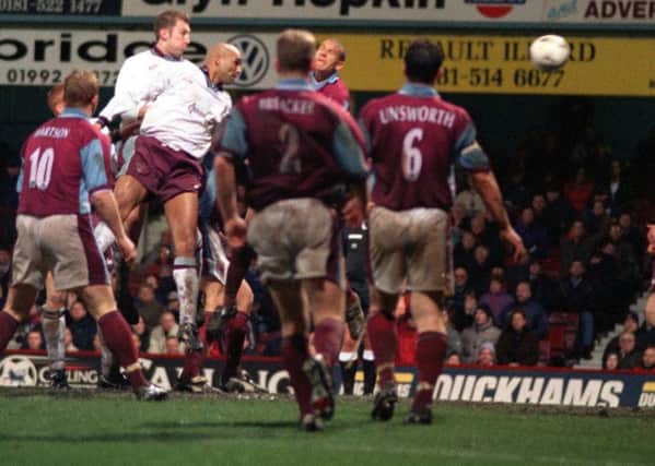Memorable moment: Paul David scores for Emley in their narrow FA Cup third round defeat at West Ham.