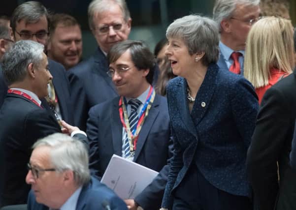 Theresa May arrives at last Thursday's EU summit.