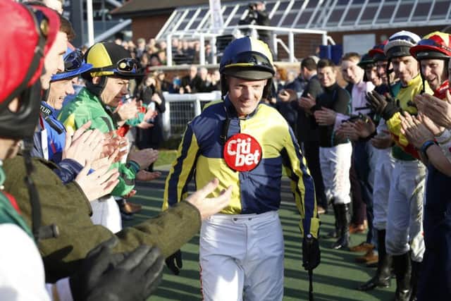 Noel Fehily walks out to the Newbury paddock before his final ride which saw the 43-year-old record an emotional victory aboard Get In The Queue.
